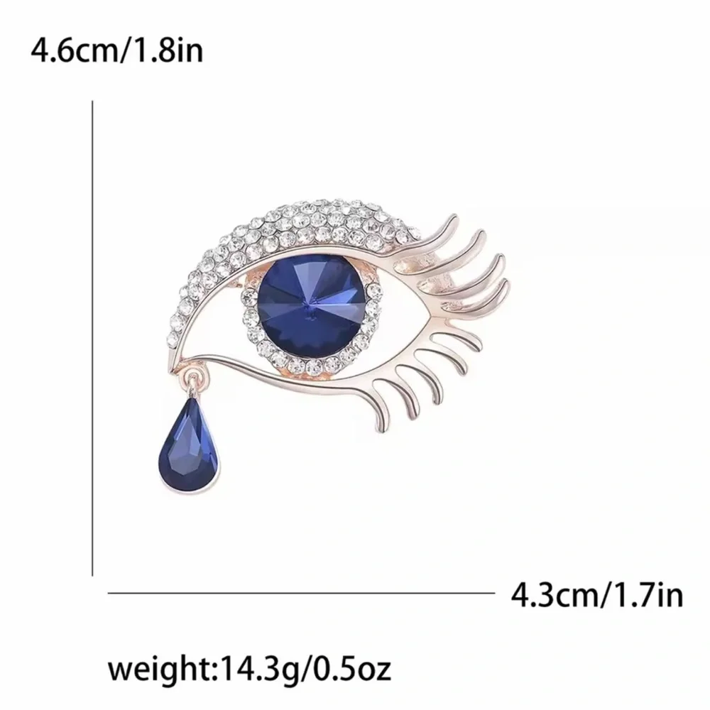 Elegant Blue and Gold Eye Brooch